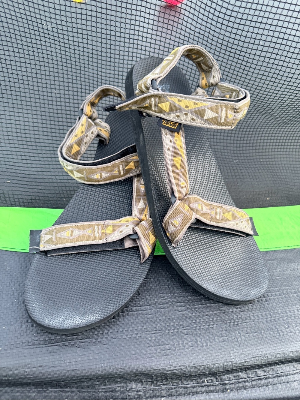 Teva Women's Black Sandals with Tan and Yellow Geometric Straps